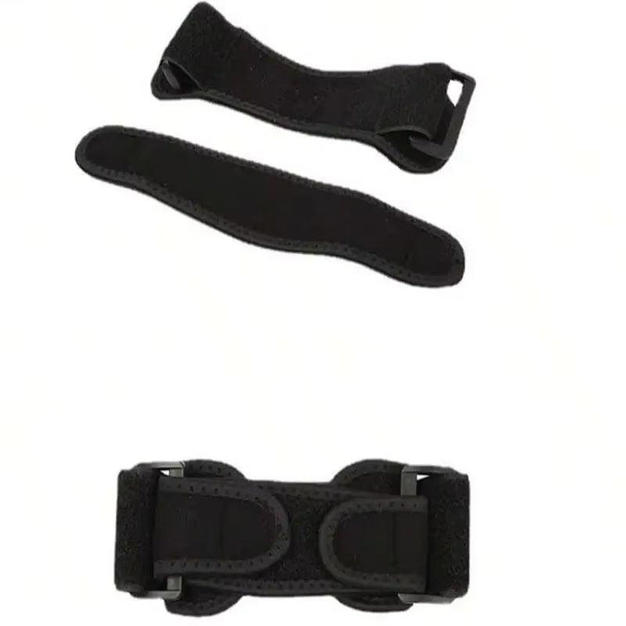 Black knee strap components laid out flat