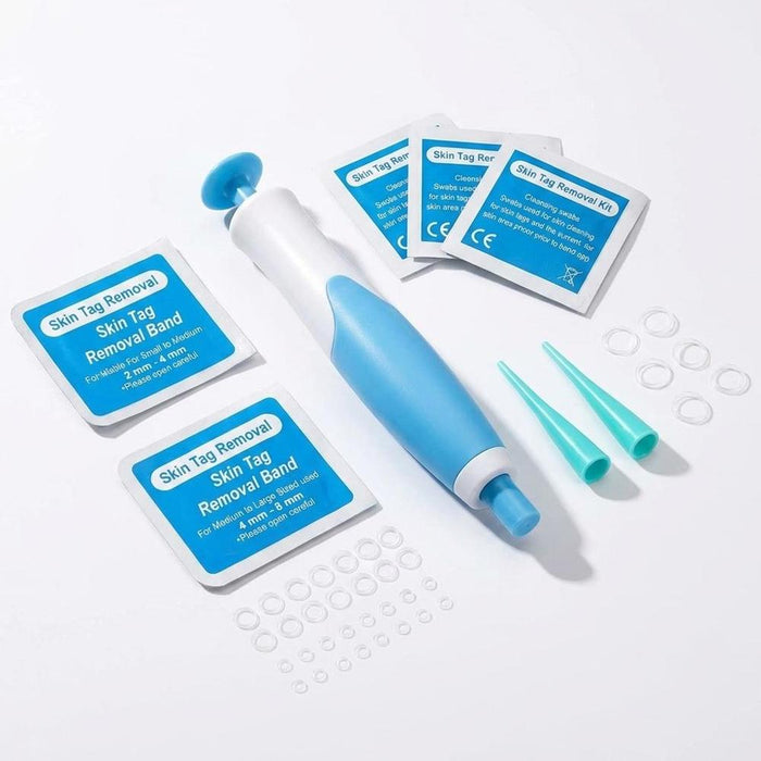 Auto skin tag removal kit components on white background