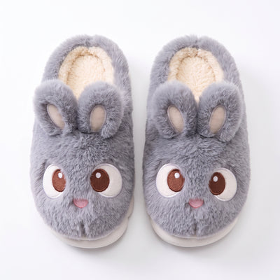 Top-down view of gray bunny slippers side by side