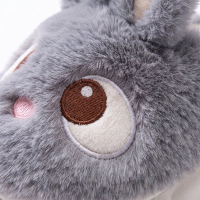 Macro closeup of plush fur texture and stitched bunny eye