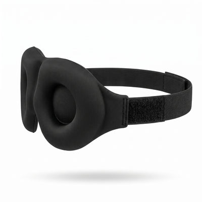 Side profile of sleep mask showing curved eye-cup depth