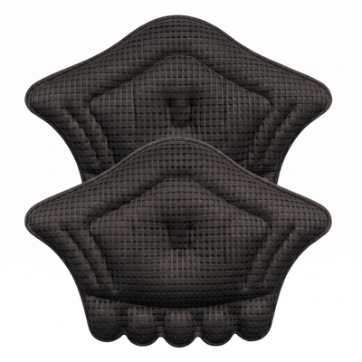 Pair of black heel cushion pads on white background, mesh fabric surface