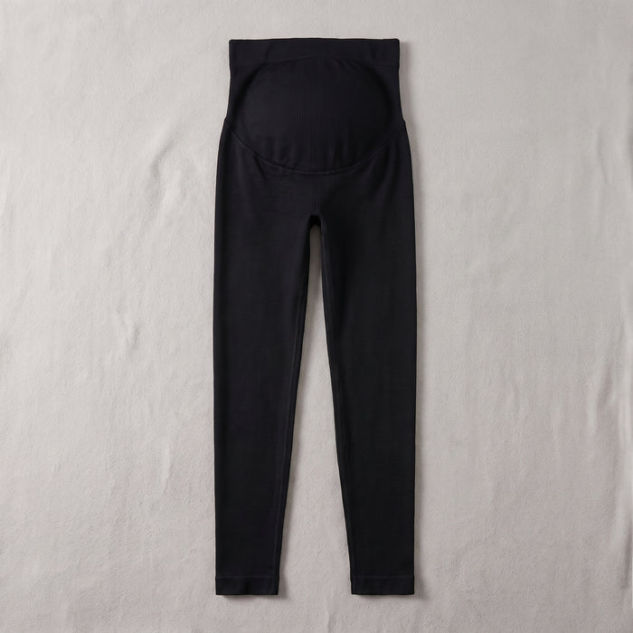 Black high-waist maternity leggings flat lay with belly panel