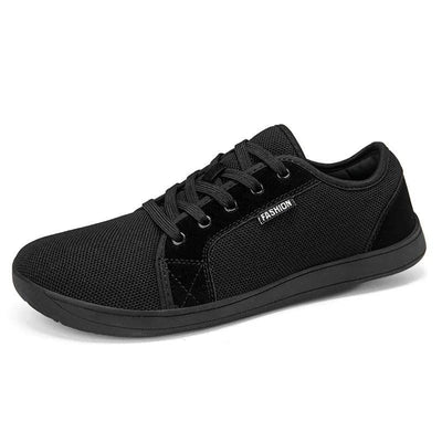 Black barefoot sneaker with wide toe box, hero angle