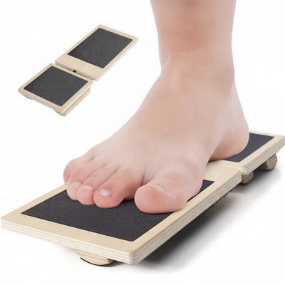 Foot stepping onto balance board showing proper use