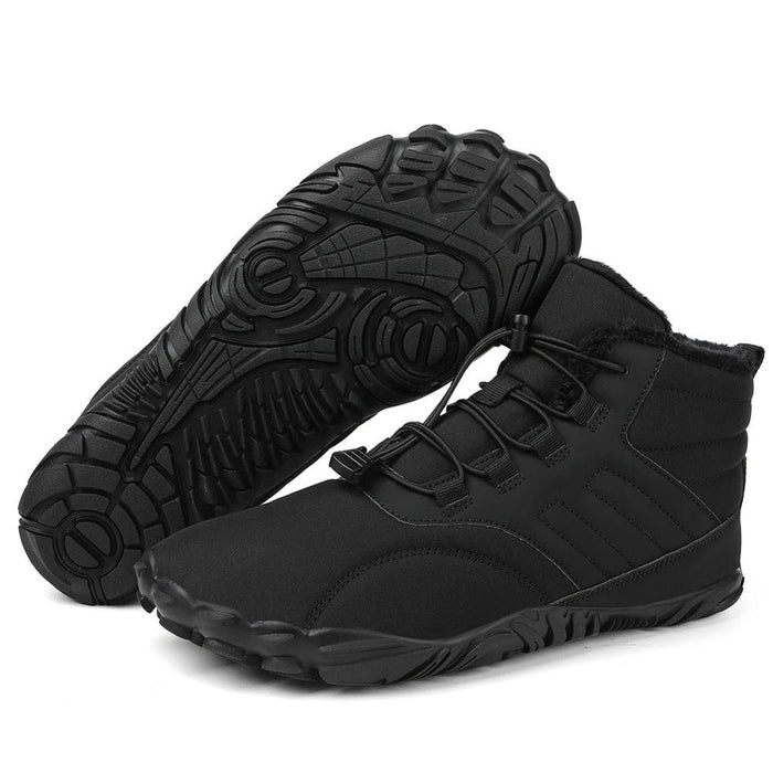 Black barefoot winter boots pair showing rugged sole