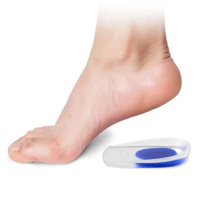Bare foot next to gel heel cup showing placement position
