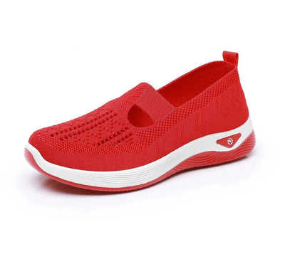 Red breathable slip-on walking shoe, side view