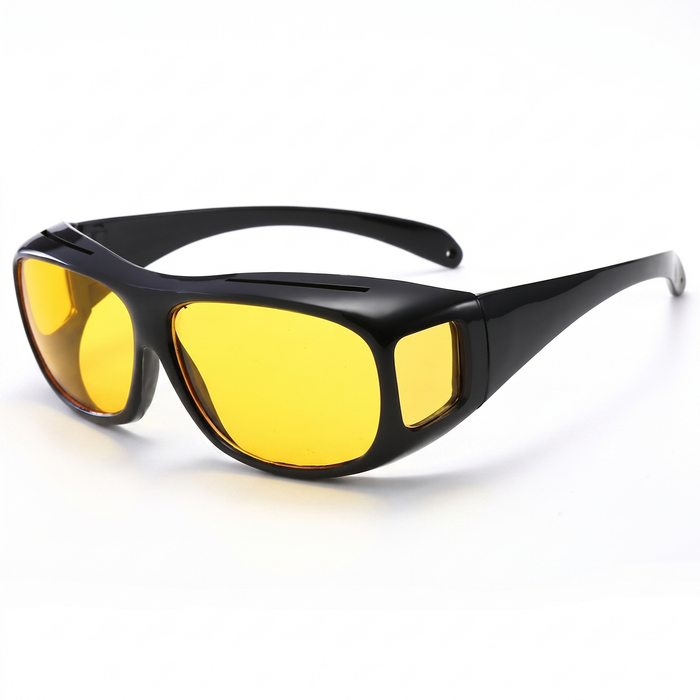Night vision fit-over driving glasses with yellow lenses on white background